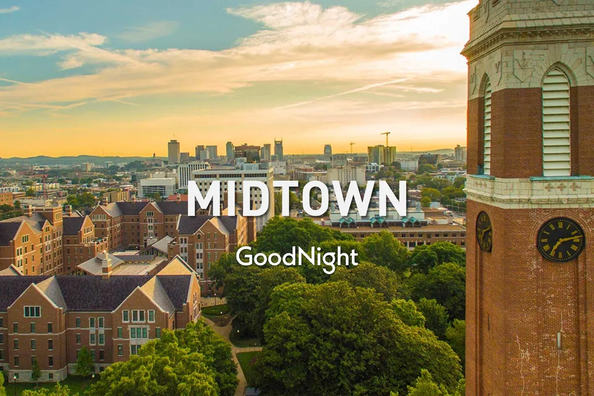 This exterior view showcases Nashville's iconic city skyline, historic buildings, a prominent clock tower, and lush greenery in the foreground. The tranquil ambience invites exploration and urban discovery, connecting the property directly to Nashville's walkable urban heart.